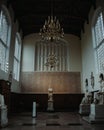 Vertical shot of the interior of the Trinity College with statues in Cambridge, England