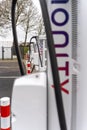 Vertical shot of Ionity electric car charger at highway pull-in Royalty Free Stock Photo