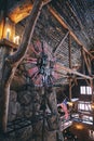 Vertical shot of an iron clock in Old Faithful Inn hotel, Yellowstone National Park, Wyoming USA Royalty Free Stock Photo