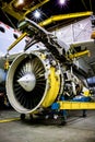 Vertical shot of a jet engine sitting on the maintenance floor in Winnipeg, Canada