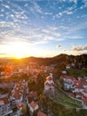 Vertical shot of the Kamnik town in Slovenia during the golden sunset