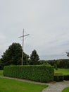 Vertical shot of a Lidice Memorial cross statue to the Children Victims of World War II in a park Royalty Free Stock Photo