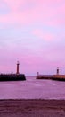 Vertical shot of the lighthouse,the beacon on west and east Whitby pier, in North Yorkshire, England Royalty Free Stock Photo