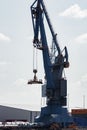 Vertical shot of loading cranes in the new port of Hamburg, Germany Royalty Free Stock Photo