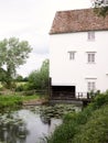 Vertical shot of the Lode mill and the sluice in East Cambridgeshire, England Royalty Free Stock Photo