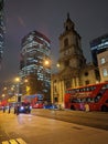 Vertical shot of London on a foggy night during the Christmas season.