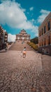 Vertical shot of the lonely ruins of St Paul's in Macau in cloudy sky background