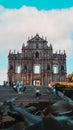 Vertical shot of the lonely ruins of St Paul's in Macau in cloudy sky background