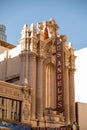 Vertical shot of Los Angeles Theatre Building in Los Angeles, California with blue sky