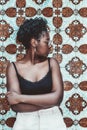 Black girl in front of Azulejo wall Royalty Free Stock Photo