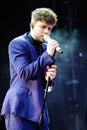 Vertical shot of Luca Haenni singing during the Swiss Music Awards ceremony