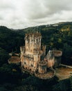 Vertical shot of the medieval Butron castle in Spain under the cloudy sky Royalty Free Stock Photo