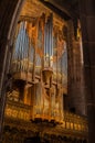 Vertical shot of a medieval organ, a keyboard instrument in the cathedral