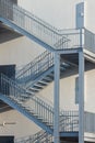 Vertical shot of metal stairs of a residential building block in daylight