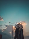 Vertical shot of a metallic sphere with "Allah" written. monument in Islamabad, Pakistan