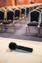 Vertical shot of microphone and auditorium