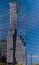 Vertical shot of a modern building with reflections of the old structures in Buenos Aires, Argentina Royalty Free Stock Photo