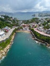 Vertical Shot: Moody Atmosphere at La Angosta Beach in Acapulco - Cloudy Sky Royalty Free Stock Photo