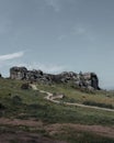 Vertical shot of the Moor Cow & Calf Rocks in Ilkley, UK Royalty Free Stock Photo