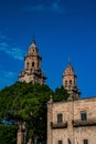 Vertical shot of the Morelia Cathedral in Michoacan, Mexico against a blue sky Royalty Free Stock Photo