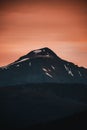 Vertical shot of a mountainous range during the sunset, best for wallpaper and background