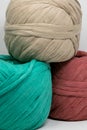 Vertical shot of multicolored knitting wool balls Royalty Free Stock Photo