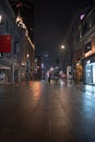 Vertical shot of the Nanjing Road pedestrian street at night in Shanghai, China.