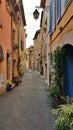 Vertical shot of a narrow alley in San Gimignano, Italy Royalty Free Stock Photo