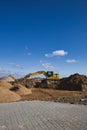 Vertical shot of a new development area, and construction vehicle, in Ascheberg, Germany Royalty Free Stock Photo