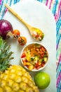 Vertical shot of a nutritious serving of Mexican pineapple salsa