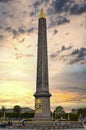 Vertical shot of the Obelisque de Louxor in Prais, France during a mesmerizing sunset