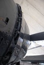 Vertical shot of an old airplane engine, side view of the cooling panels opened to allow more air into the engine Royalty Free Stock Photo