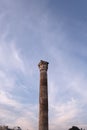 Vertical shot of an old ancient Corinthian column