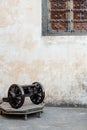 Vertical shot of an old canon near the wall of Hotel Radhika Haveli Mandawa in Rajasthan, India Royalty Free Stock Photo
