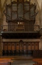 Vertical shot of an old church pipe organ above a church altar Royalty Free Stock Photo