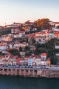 Vertical shot of the old and colorful buildings of Oporto in Portugal captured during the daytime Royalty Free Stock Photo