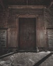 Vertical shot of the old door of the Picos de Europa, Asturias, Spain Royalty Free Stock Photo