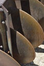 Vertical shot of an old farm plow blade Royalty Free Stock Photo