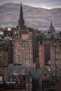 Vertical shot of old gothic buildings in downtown Edinburgh, Scotland