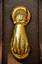 Vertical shot of an old manual door knocker Royalty Free Stock Photo