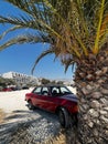 Vertical shot of an old Mercedes car at the city beach of Split, Croatia