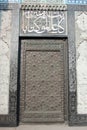 Vertical shot of an old metal door of an ancient building in Saint Petersburg, Russia