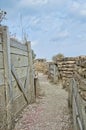 Vertical shot of an old military bunker base with rocks and sandbags Royalty Free Stock Photo