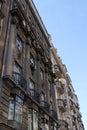 Vertical shot of an old multi-story residential building in Serbia