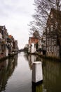 Vertical shot of one of the canals in Dordrecht in the Netherlands Royalty Free Stock Photo