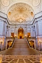 Vertical shot of the ornamented main hall interior of the San Francisco City Hall