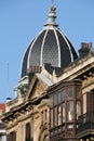 Vertical shot of an ornate dome adorns the top of a traditional building in Bilbao, Basque Country