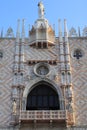 Vertical shot of the ornate statue in the southern part of the Doge's Palace in Venice, Italy