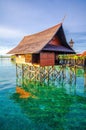 Vertical shot of an overwater bungalow in Kapalai Resort in Malaysia - perfect for wallpaper