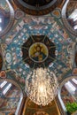 Vertical shot of the painting of Jesus Christ painted on the ceiling of a church